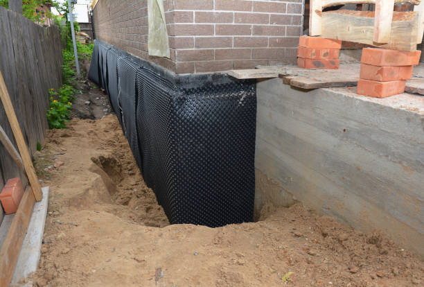 Happy homeowners after waterproofing job in Potomac